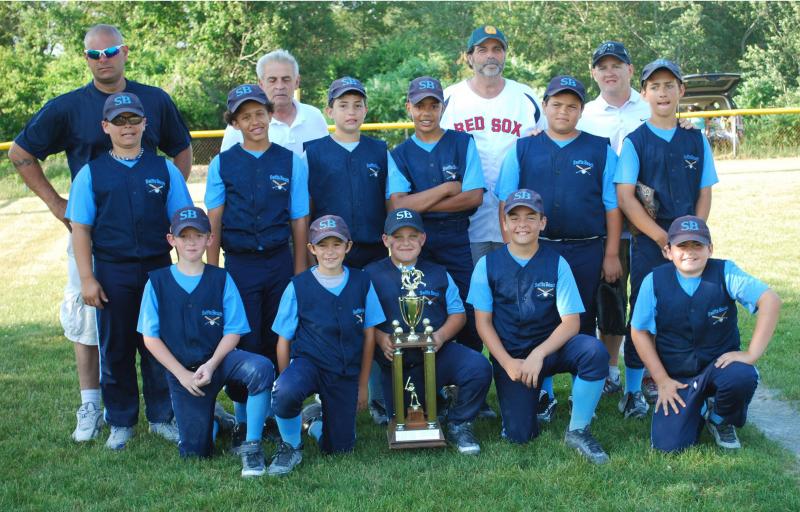 Back row: Coach Chad Bariteau, Head Coach Ron Frazier, Score Keeper Pat Tropeano, Coach Chris Thornell. Middle row: Cam Cariteau, Marcus Monteiro, Brett Thrower, Legend Fernandes, Aaron Benitez-Gaudette, Brian Whitney. Front row: Connor Walsh, Jackson Cote, Riley Thornell, Erik Zine, Ryan Tropeano. COURTESY CHRIS THORNELL